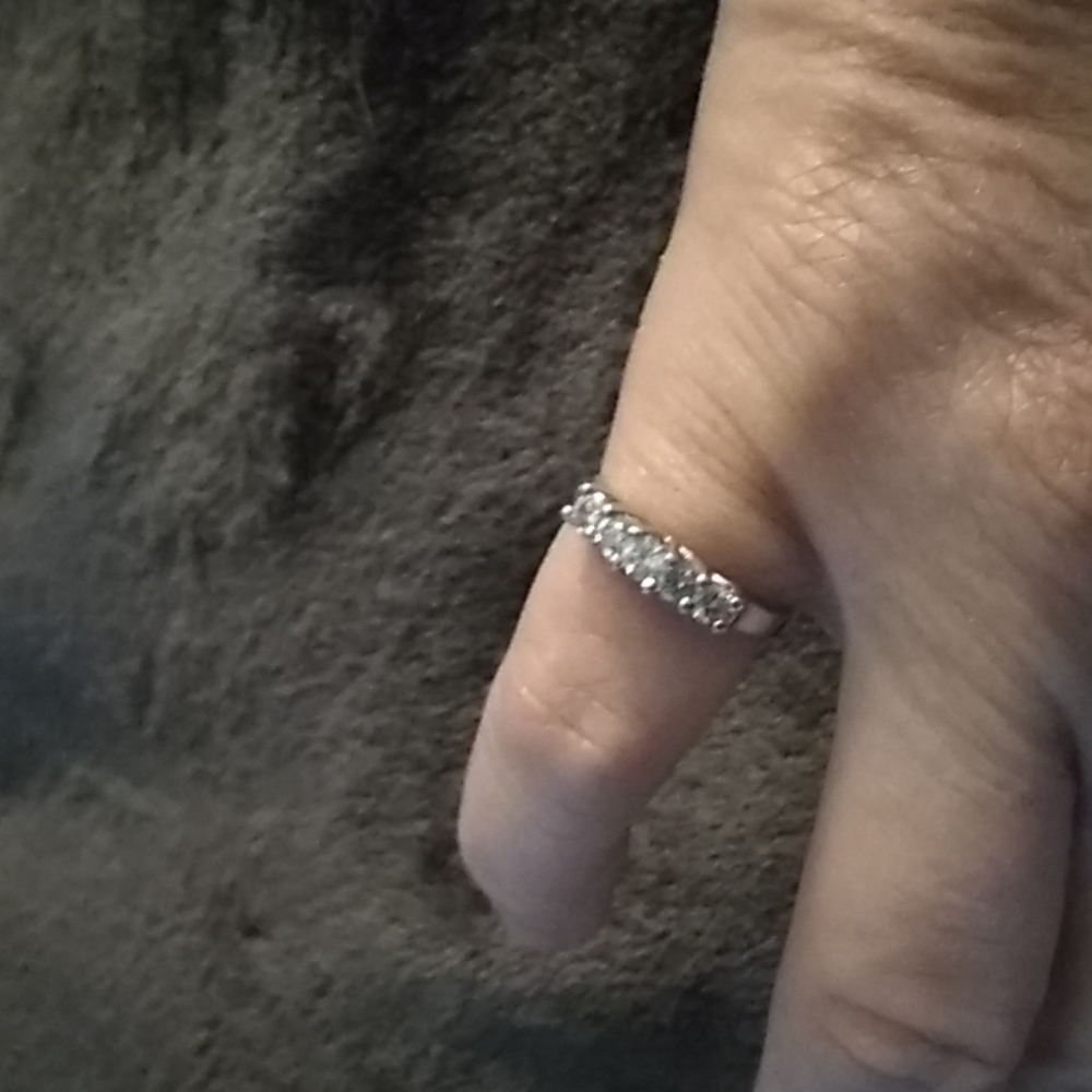 Platinum ring with 5 small diamonds